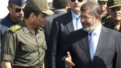 مرسي والسيسي watanserb.com