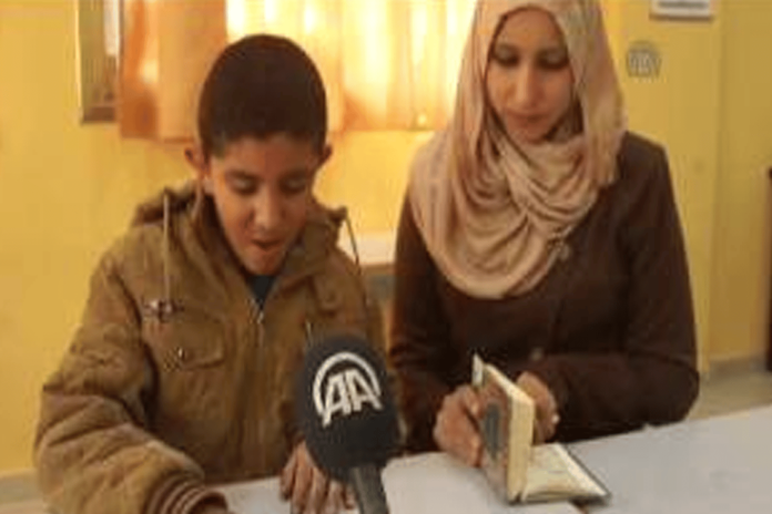 طفل توحد يحفظ القرآن كاملاً watanserb.com