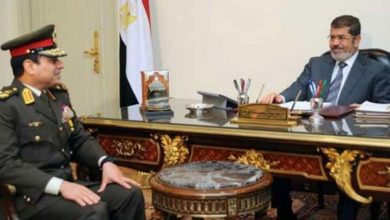 محمد مرسي والسيسي watanserb.com