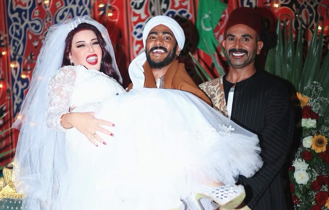 أحمد سعد مع طليقته سمية الخشاب في زفافها على محمد رمضان بمسلسل موسى watanserb.com