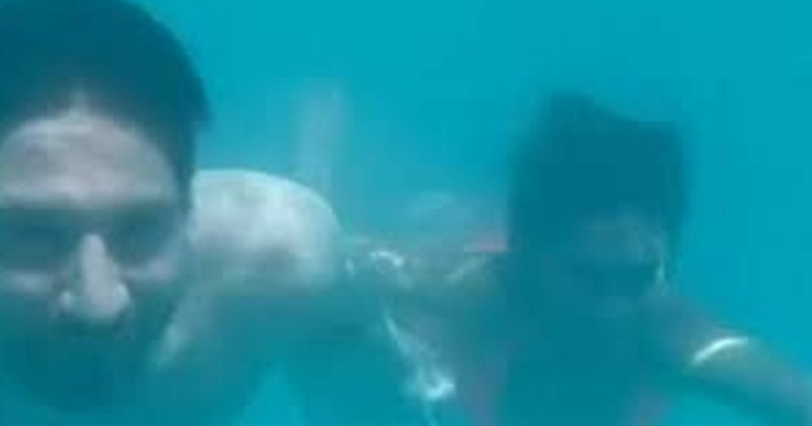 ميسي و زوجته تحت الماء 