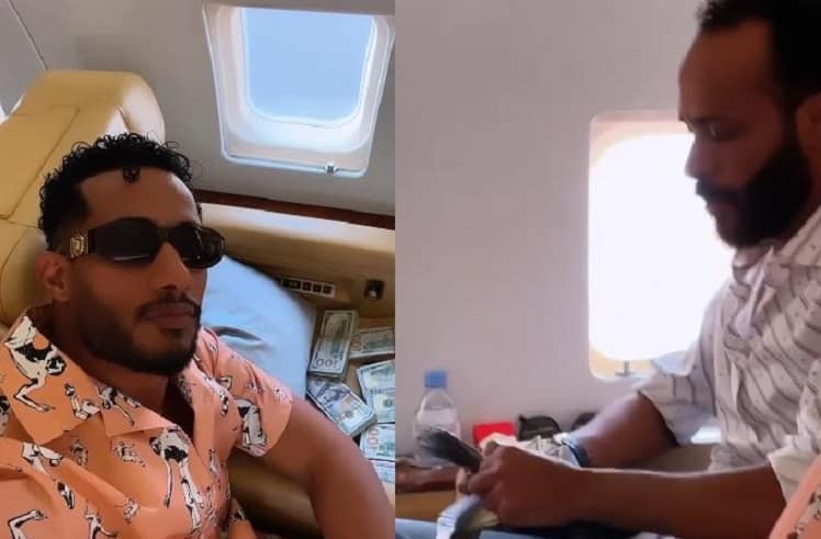 محمد رمضان بتصرف صادم برُزم النقود داخل الطائرة بعد إلزامه بدفع 700 ألف دولار! (فيديو) watanserb.com