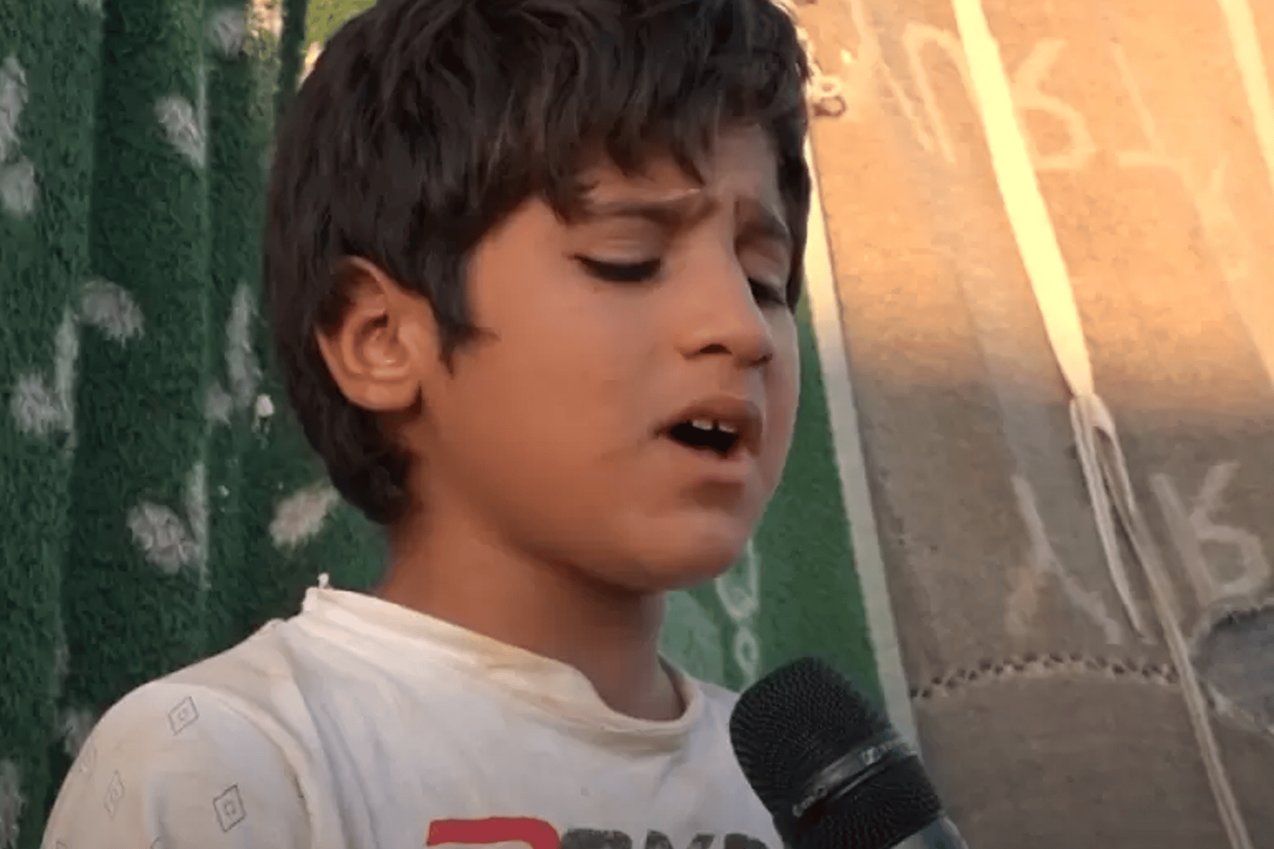 معاناة طفل سوري watanserb.com