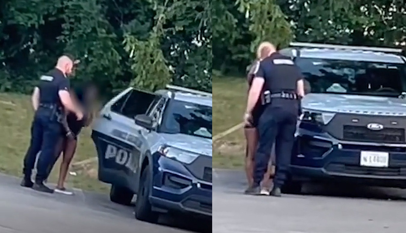 فضيحة ضابط شرطة أمريكي وهو يقبل امرأة شبه عارية ويختلي بها في سيارة الشرطة