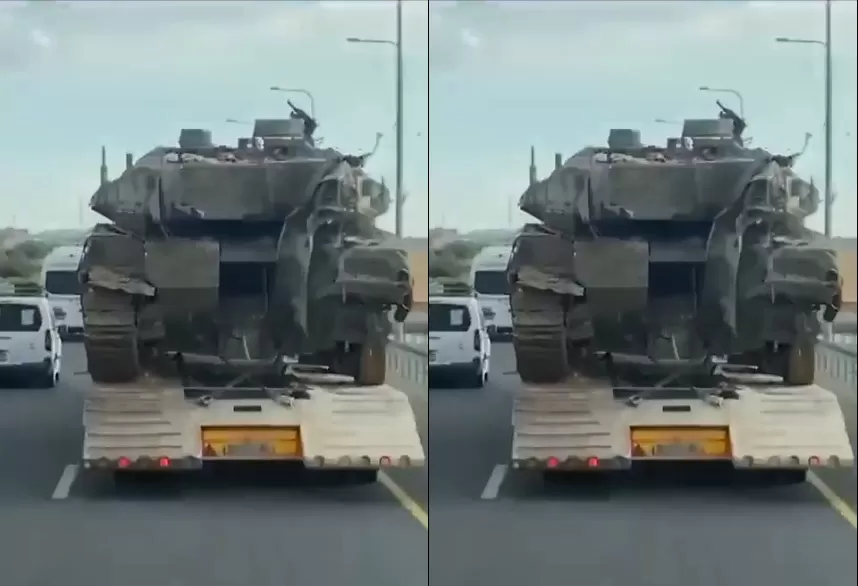 شاحنة تنقل دبابة إسرائيلية دمرتها المقاومة الفلسطينية