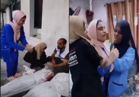 ممرضة فلسطينية تودع أختها وأبناءها بعد استشهادهم بقصف الاحتلال في غزة