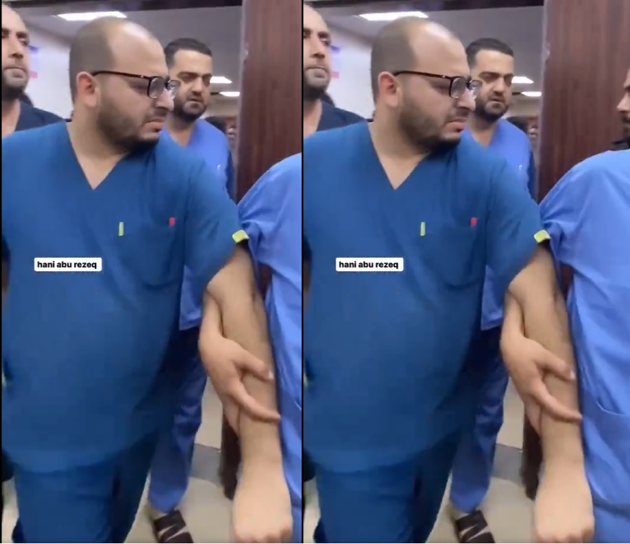 الدكتور باسم النجار في مستشفى شهداء الأقصى أثناء تلقيه نبأ استشهاد عدد من أفراد عائلته